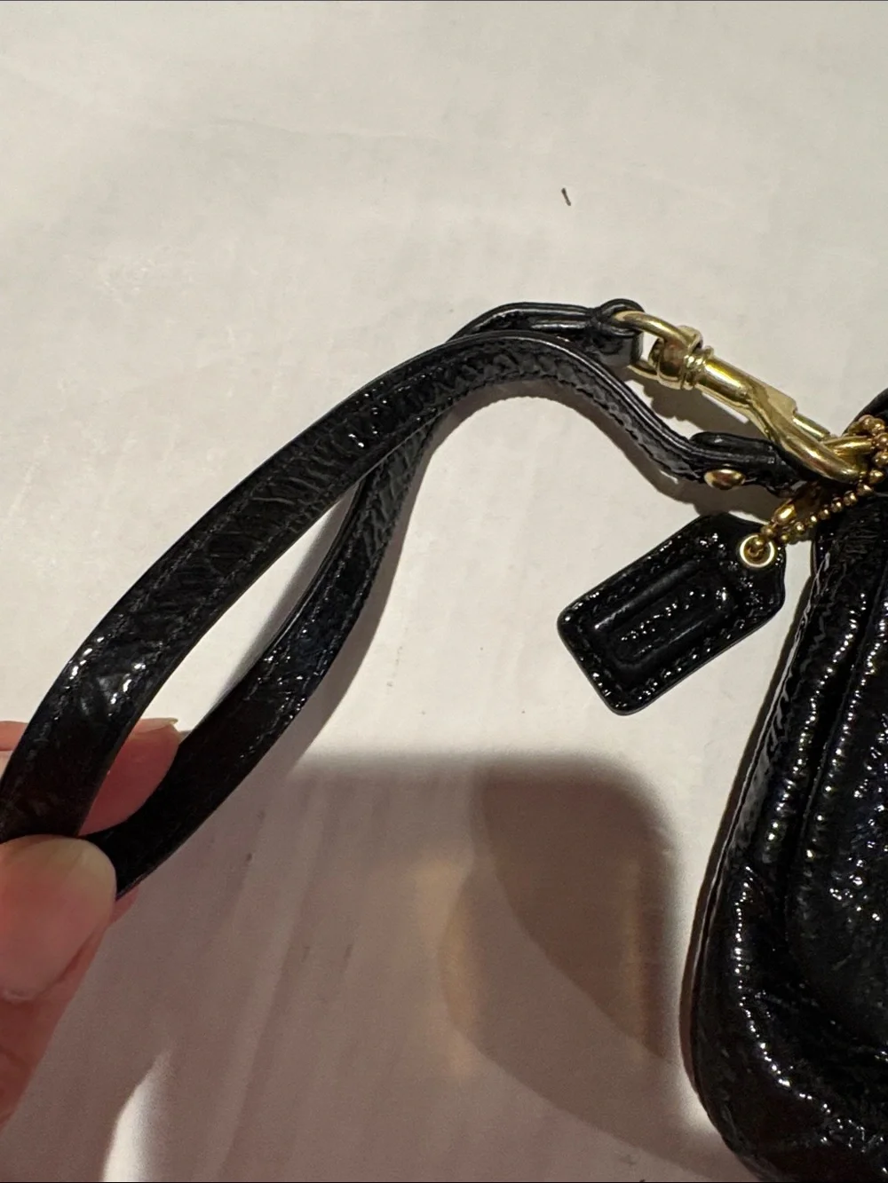 Coach Kristen Black Patent Leather Wristlet Phone Pouch with Gold Hardware